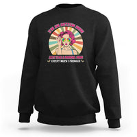 Black sweatshirt with front “I’m an Autism Mom” graphic and colorful character.