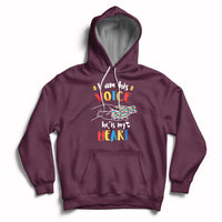 Maroon autism awareness hoodie with 'VOICE' and 'HEART' graphic, front pocket and hood