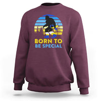 Maroon graphic sweatshirt with Bigfoot silhouette and 'BORN TO BE SPECIAL' front design
