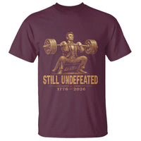 Funny Abraham Lincoln Squatting Barbell Semiquincentennial T Shirt Still Undefeated 1776 to 2026 Muscular President Gym Bodybuilder