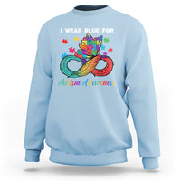Light blue autism awareness sweatshirt with colorful puzzle feather graphic and crew neck