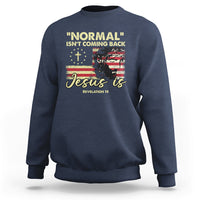 Navy crewneck sweatshirt with front religious quote graphic: "Jesus is"