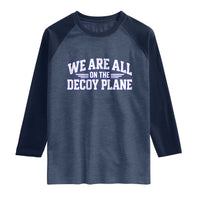 We Are All On The Decoy Plane Theories Aviator Wings Blue Raglan Shirt Funny Satirical Meme Conspiracy Commentary