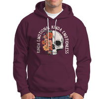 Maroon pullover hoodie with white drawstring and floral skull graphic on chest.