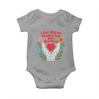 I Hear Migrant Children Also Have Heartbeats Baby Onesie Groovy Retro Floral Hands Heart Social Justice