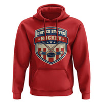 Hockey Crossed Sticks And Puck Retro USA Shield Flag Hoodie Red White Blue Striped Patriotic Sports Fan Pride Graphic