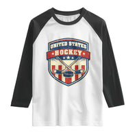 Hockey Crossed Sticks And Puck Retro USA Shield Flag Raglan Shirt Red White Blue Striped Patriotic Sports Fan Pride Graphic