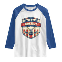 Hockey Crossed Sticks And Puck Retro USA Shield Flag Raglan Shirt Red White Blue Striped Patriotic Sports Fan Pride Graphic