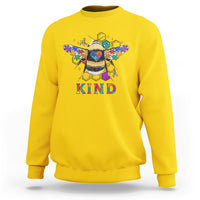 Daisy yellow crewneck sweatshirt with colorful bee graphic and "KIND" print on chest
