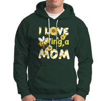 Dark forest green sunflower bee mom hoodie with floral bee graphic and text, front kangaroo pocket