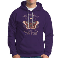 Purple hoodie with front moth graphic and "You Are What You Manifest" text