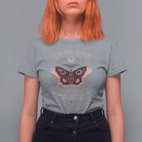 Women’s light gray graphic t-shirt with colorful moth and celestial text design on front.