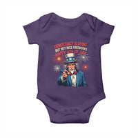 Funny 4th of July Democracy Is Dying Baby Onesie But Hey Nice Fireworks Satirical Uncle Sam - Wonder Print Shop