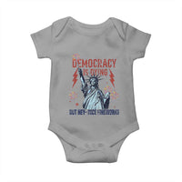 Democracy Is Dying But Hey Nice Fireworks Statue of Liberty Baby Onesie Funny 4th Of July Retro - Wonder Print Shop