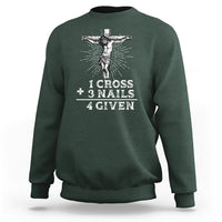 Forest green crewneck sweatshirt with white crucifix graphic and text “1 CROSS 3 NAILS 4 GIVEN”.
