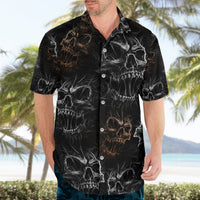 Black Hawaiian shirt with skull pattern, short sleeves, and button-up front.