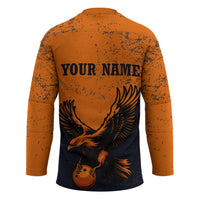Flying Eagle Carrying Bowling Ball Hockey Jersey with Grunge Orange and Black Splatter Design - Wonder Print Shop