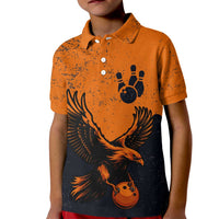 Flying Eagle Carrying Bowling Ball Kid Polo Shirt with Grunge Orange and Black Splatter Design - Wonder Print Shop