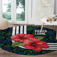 Sierra Leone Round Carpet with Red Hibiscus Floral Design and Tribal Swirl Pattern