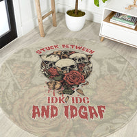 stuck-between-idk-idc-and-idgaf-skull-round-carpet