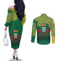 Togo Couples Matching Off The Shoulder Long Sleeve Dress and Long Sleeve Button Shirt with Red Twin Lions and Travail Liberté Patrie Slogan