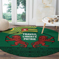 Togo Round Carpet with Red Twin Lions and Travail Liberté Patrie Slogan