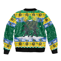 Gabon Christmas Bomber Jacket with Black Panthers Carrying Tree and Green Yellow Snowflake Pattern - Wonder Print Shop