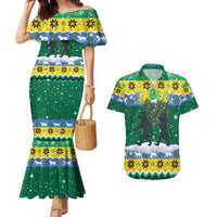 Gabon Christmas Couples Matching Mermaid Dress and Hawaiian Shirt with Black Panthers Carrying Tree and Green Yellow Snowflake Pattern - Wonder Print Shop