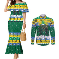 Gabon Christmas Couples Matching Mermaid Dress and Long Sleeve Button Shirt with Black Panthers Carrying Tree and Green Yellow Snowflake Pattern - Wonder Print Shop