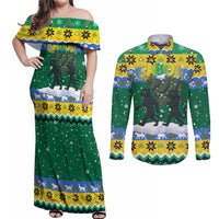Gabon Christmas Couples Matching Off Shoulder Maxi Dress and Long Sleeve Button Shirt with Black Panthers Carrying Tree and Green Yellow Snowflake Pattern - Wonder Print Shop