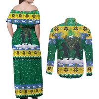 Gabon Christmas Couples Matching Off Shoulder Maxi Dress and Long Sleeve Button Shirt with Black Panthers Carrying Tree and Green Yellow Snowflake Pattern - Wonder Print Shop