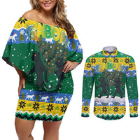 Gabon Christmas Couples Matching Off Shoulder Short Dress and Long Sleeve Button Shirt with Black Panthers Carrying Tree and Green Yellow Snowflake Pattern - Wonder Print Shop