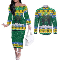 Gabon Christmas Couples Matching Off The Shoulder Long Sleeve Dress and Long Sleeve Button Shirt with Black Panthers Carrying Tree and Green Yellow Snowflake Pattern - Wonder Print Shop