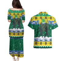 Gabon Christmas Couples Matching Puletasi and Hawaiian Shirt with Black Panthers Carrying Tree and Green Yellow Snowflake Pattern - Wonder Print Shop