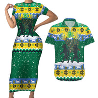 Gabon Christmas Couples Matching Short Sleeve Bodycon Dress and Hawaiian Shirt with Black Panthers Carrying Tree and Green Yellow Snowflake Pattern - Wonder Print Shop
