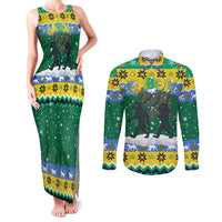 Gabon Christmas Couples Matching Tank Maxi Dress and Long Sleeve Button Shirt with Black Panthers Carrying Tree and Green Yellow Snowflake Pattern - Wonder Print Shop