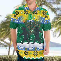 Gabon Christmas Hawaiian Shirt with Black Panthers Carrying Tree and Green Yellow Snowflake Pattern - Wonder Print Shop