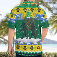 Gabon Christmas Hawaiian Shirt with Black Panthers Carrying Tree and Green Yellow Snowflake Pattern - Wonder Print Shop