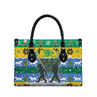 Gabon Christmas Leather Bag with Black Panthers Carrying Tree and Green Yellow Snowflake Pattern - Wonder Print Shop