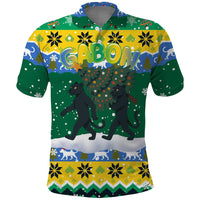 Gabon Christmas Polo Shirt with Black Panthers Carrying Tree and Green Yellow Snowflake Pattern - Wonder Print Shop