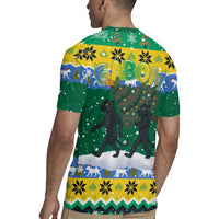 Gabon Christmas Rugby Jersey with Black Panthers Carrying Tree and Green Yellow Snowflake Pattern - Wonder Print Shop