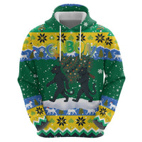 Gabon Christmas Zip Hoodie with Black Panthers Carrying Tree and Green Yellow Snowflake Pattern - Wonder Print Shop