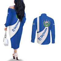 El Salvador Coat of Arms Couples Matching Off The Shoulder Long Sleeve Dress and Long Sleeve Button Shirt with Curved Text and Blue Patterned Background - Wonder Print Shop