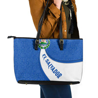 El Salvador Coat of Arms Leather Tote Bag with Curved Text and Blue Patterned Background - Wonder Print Shop
