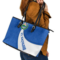 El Salvador Coat of Arms Leather Tote Bag with Curved Text and Blue Patterned Background - Wonder Print Shop