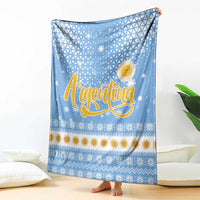 Argentina Christmas Blanket with Blue-White Snowflake Pattern, Sun Emblem, and Gaucho Santa Riding Horse Motif - Wonder Print Shop