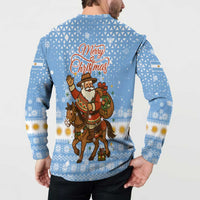 Argentina Christmas Button Sweatshirt with Blue-White Snowflake Pattern, Sun Emblem, and Gaucho Santa Riding Horse Motif - Wonder Print Shop