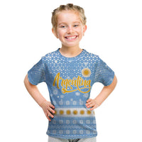 Argentina Christmas Kid T Shirt with Blue-White Snowflake Pattern, Sun Emblem, and Gaucho Santa Riding Horse Motif - Wonder Print Shop