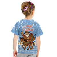 Argentina Christmas Kid T Shirt with Blue-White Snowflake Pattern, Sun Emblem, and Gaucho Santa Riding Horse Motif - Wonder Print Shop