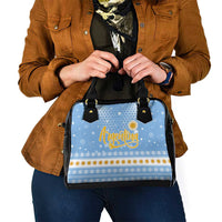 Argentina Christmas Shoulder Handbag with Blue-White Snowflake Pattern, Sun Emblem, and Gaucho Santa Riding Horse Motif - Wonder Print Shop